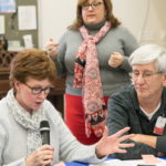 Search committee member Donna Cowden, Canon Catherine Massey (standing), and Bill Cowden
